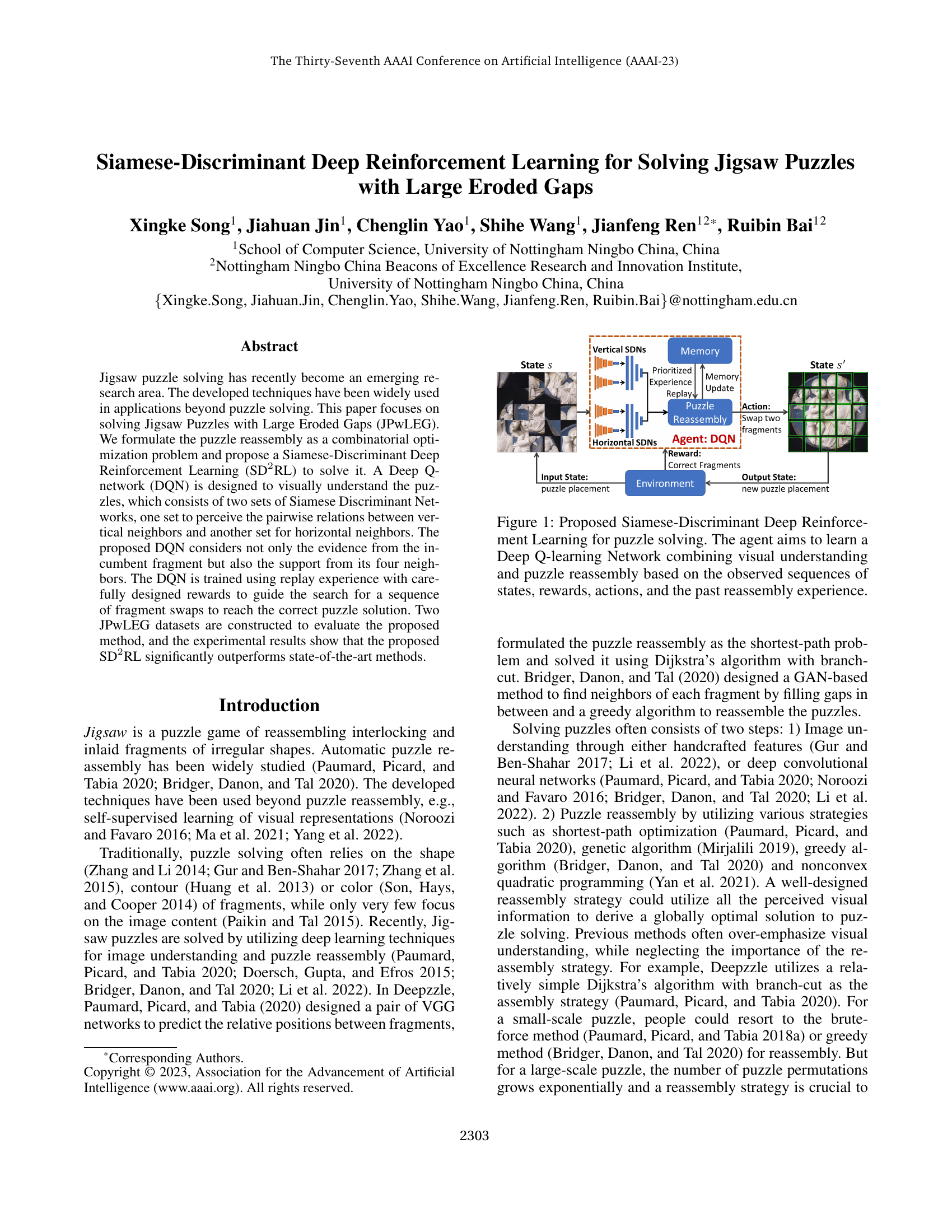 Siamese-Discriminant Deep Reinforcement Learning for Solving Jigsaw Puzzles with